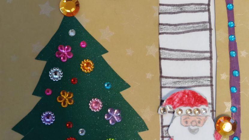 Ręcznie zdobiona kartka świąteczna wykonana przez uczniów